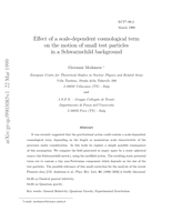 Effect of a scale-dependent cosmological term on the motion of small test particles in a Schwarzschild background