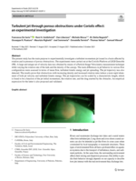 Turbulent jet through porous obstructions under Coriolis effect: an experimental investigation
