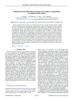 Transition between light-induced attraction and repulsion of nanoparticles on a lithium niobate surface
